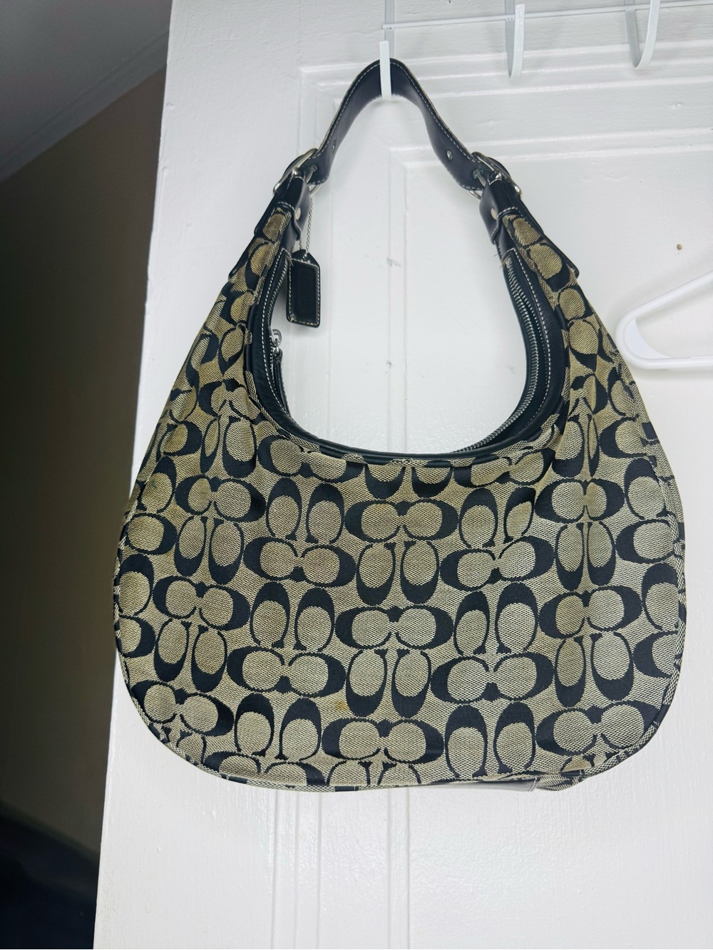 Coach hobo Vintage Black and Tan Signature Hobo Bag